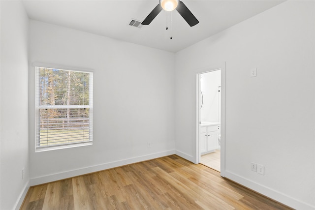 unfurnished room with ceiling fan and light hardwood / wood-style flooring