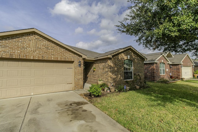 single story home featuring a garage and a front lawn