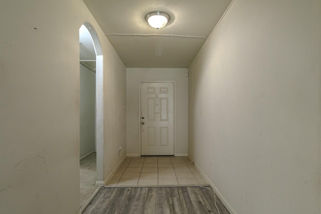 hall with light wood-type flooring