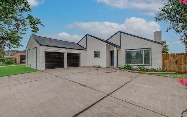 ranch-style house with a garage