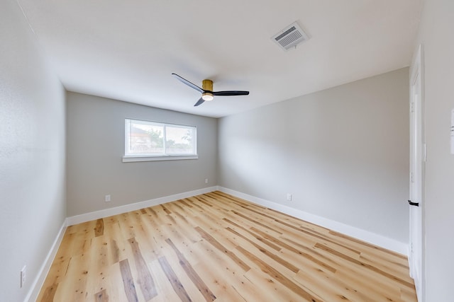 unfurnished room with ceiling fan and light hardwood / wood-style floors