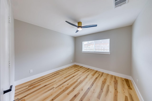 unfurnished room featuring hardwood / wood-style flooring and ceiling fan