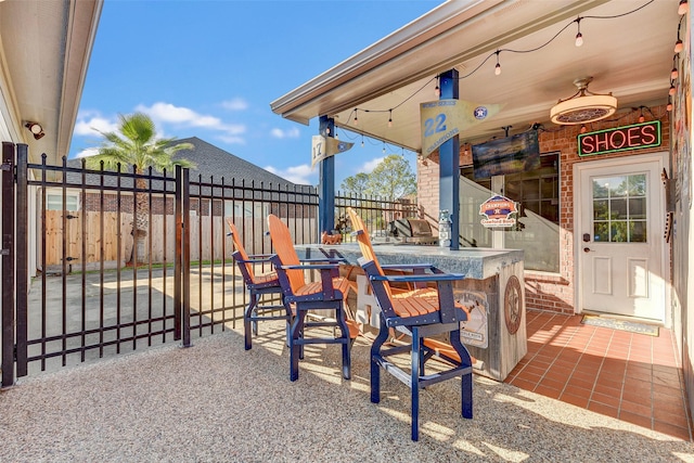 view of patio / terrace with exterior bar