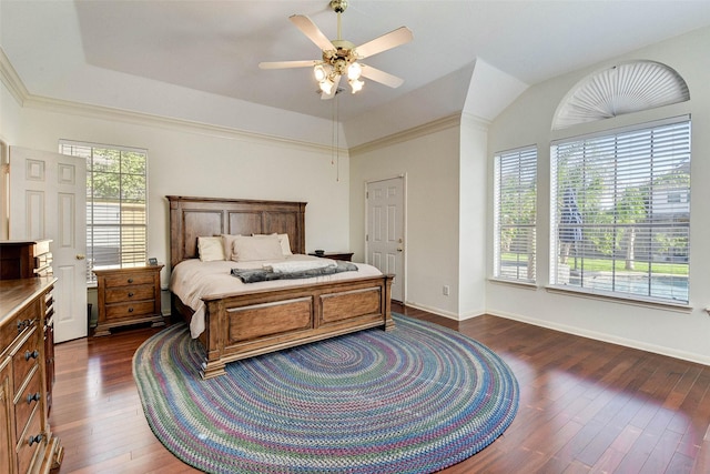 bedroom featuring lofted ceiling, dark hardwood / wood-style flooring, ceiling fan, and ornamental molding