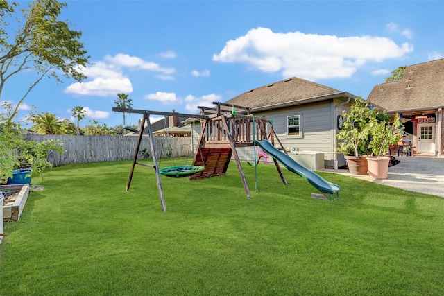 view of play area with a yard