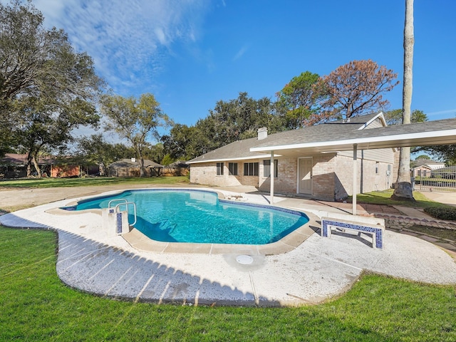 view of swimming pool featuring a patio area