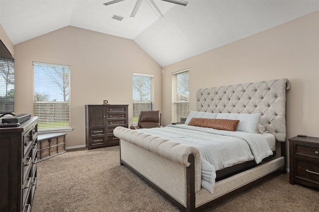 bedroom with ceiling fan, carpet floors, and lofted ceiling