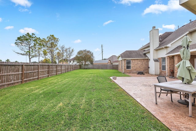 view of yard with a patio area