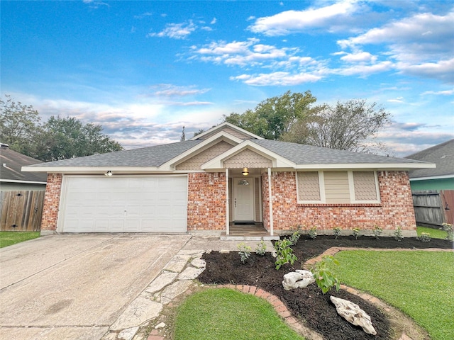 single story home featuring a garage