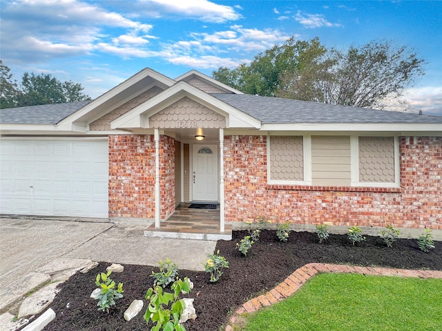 ranch-style house featuring a garage