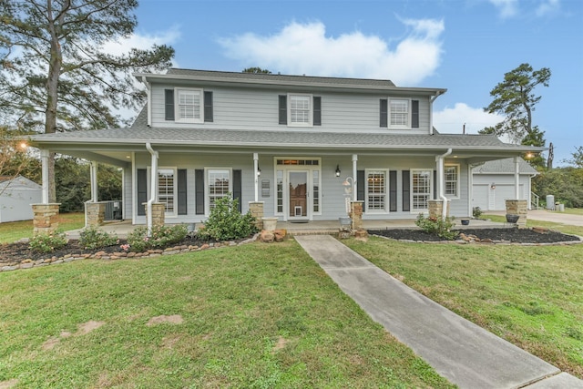 farmhouse-style home featuring a porch and a front yard