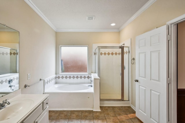 bathroom featuring vanity, separate shower and tub, and ornamental molding