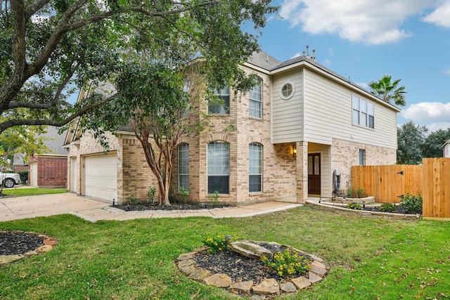 view of front of property with a garage and a front lawn