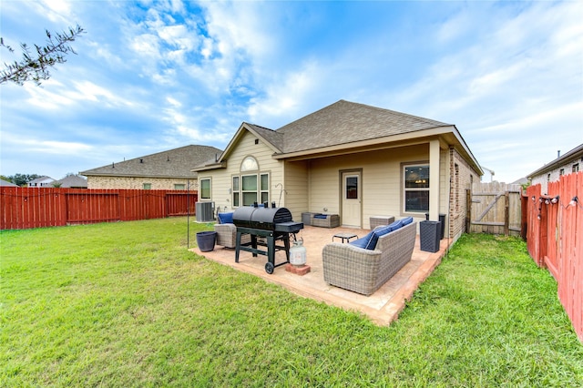 back of property featuring a yard, an outdoor hangout area, a patio area, and central air condition unit