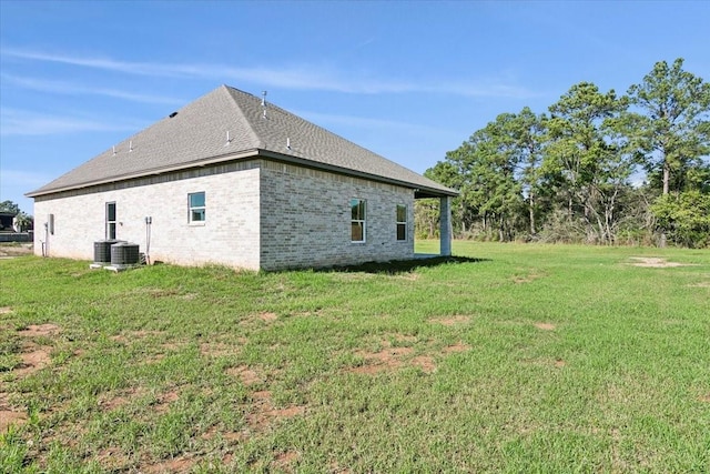 view of home's exterior featuring a yard