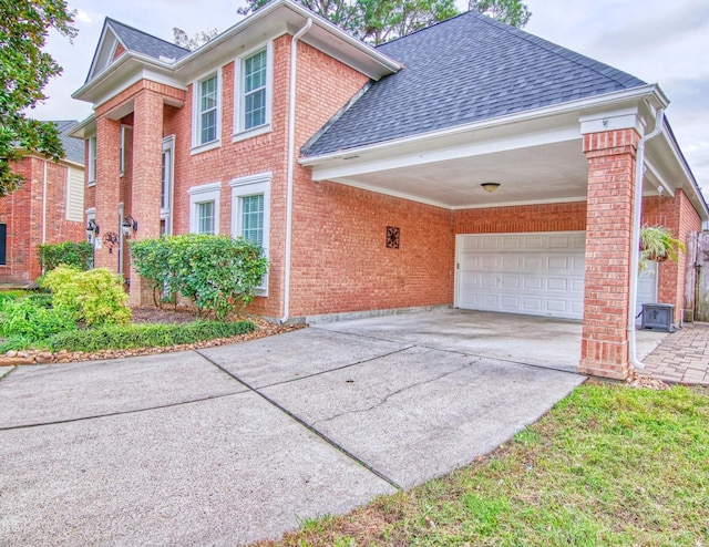 view of side of home featuring a garage