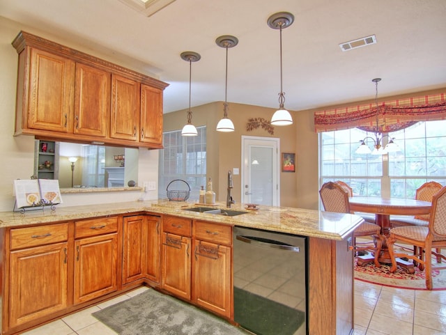 kitchen with dishwasher, pendant lighting, kitchen peninsula, and sink