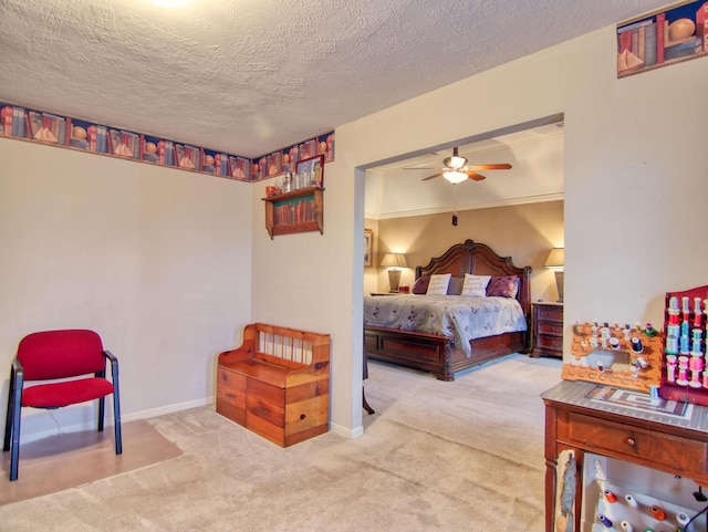 carpeted bedroom with ceiling fan, crown molding, and a textured ceiling