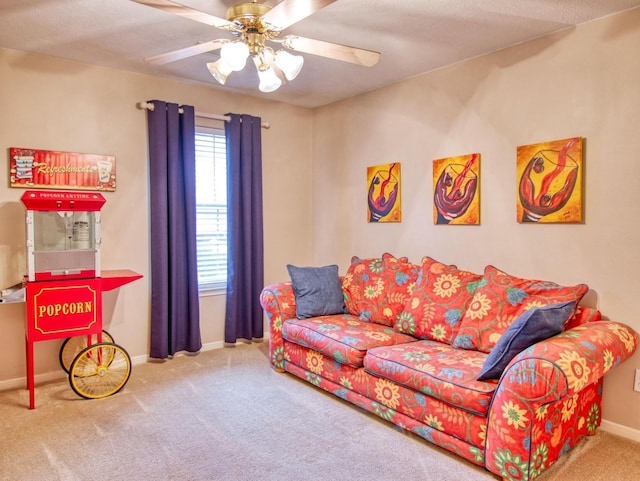 living room with carpet and ceiling fan