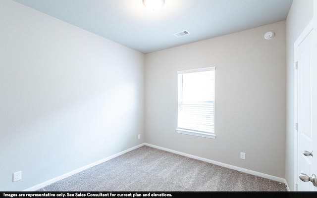 unfurnished room featuring carpet floors