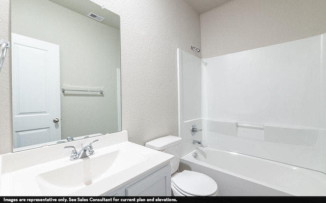 full bathroom with vanity,  shower combination, and toilet