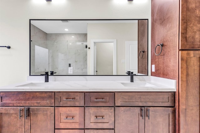 bathroom with vanity and an enclosed shower