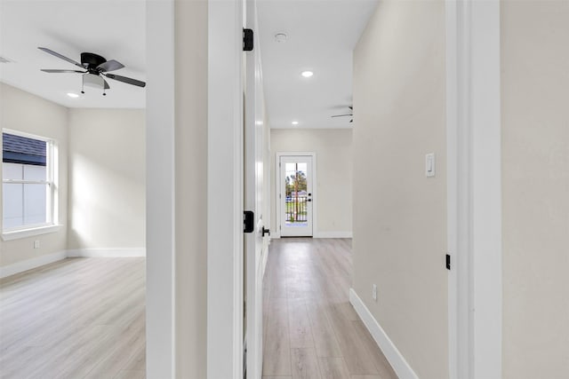 hall featuring light hardwood / wood-style flooring