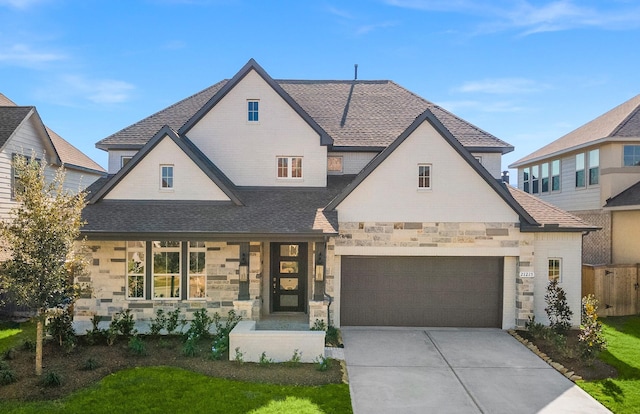 view of front of property with a garage