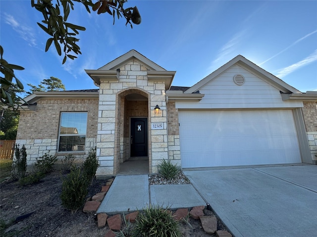 ranch-style house featuring a garage