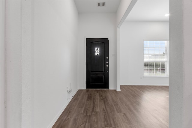12305 Delta Timber Rd, Conroe, TX 77304 - entrance foyer with dark wood-style floors and baseboards