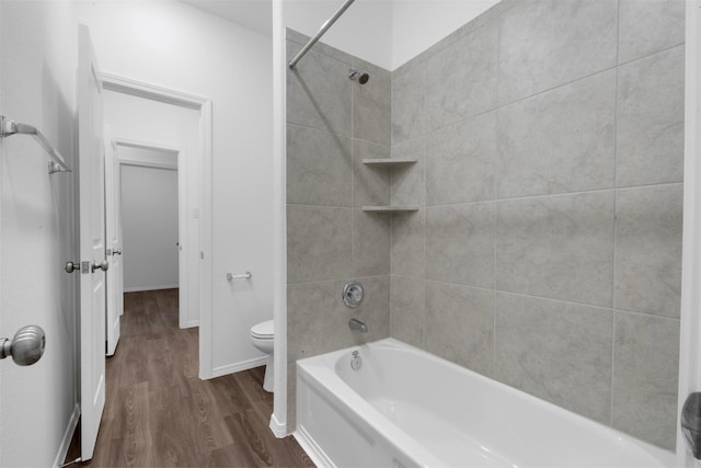 12305 Delta Timber Rd, Conroe, TX 77304 - full bathroom with wood finished floors, toilet, and  shower combination
