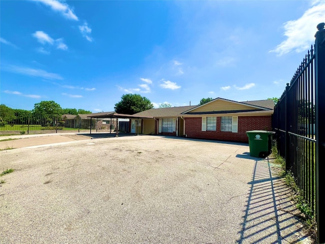 view of front of home featuring a carport