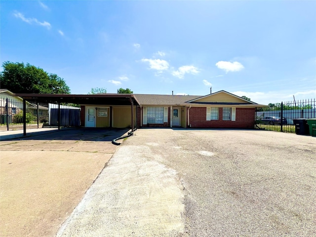 view of front of property with a carport