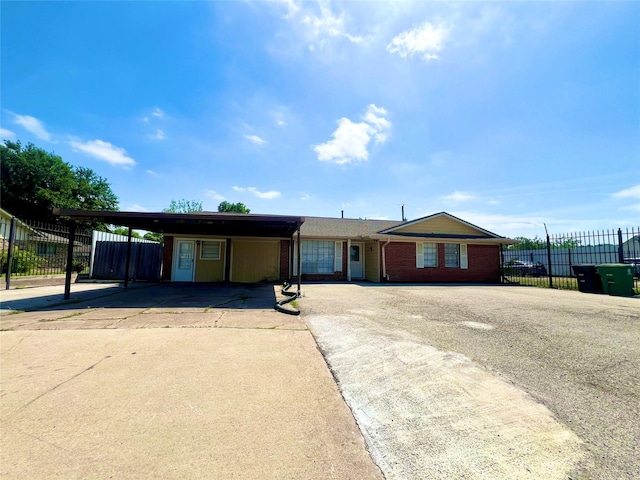 view of front of home featuring a carport