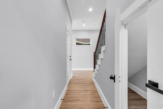 hallway featuring light hardwood / wood-style flooring