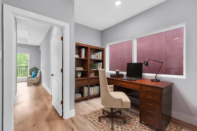 home office with light wood-type flooring