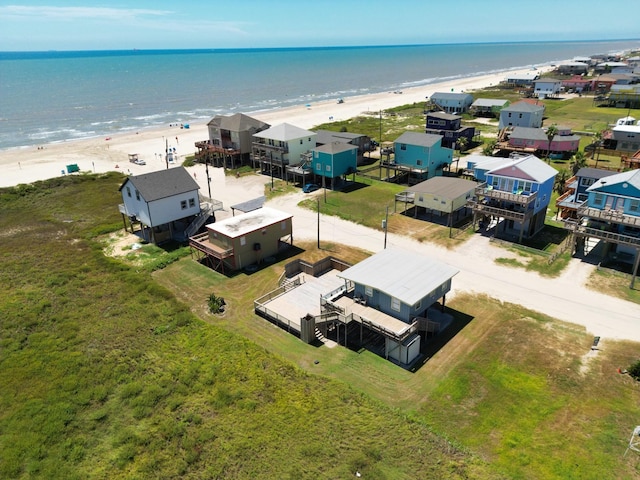 drone / aerial view with a view of the beach and a water view