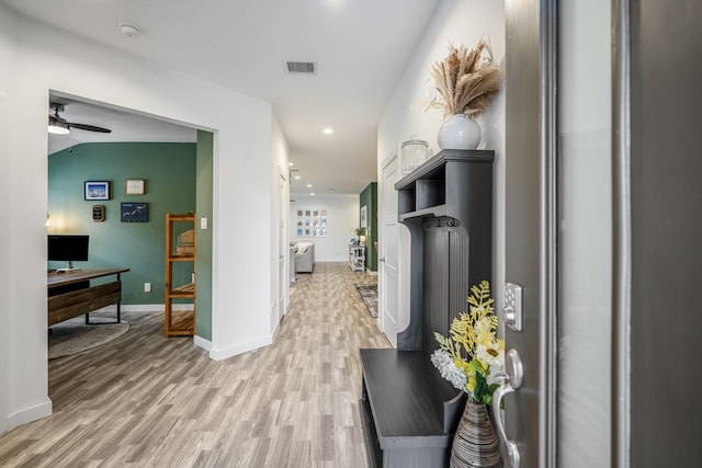 hall with light wood-type flooring