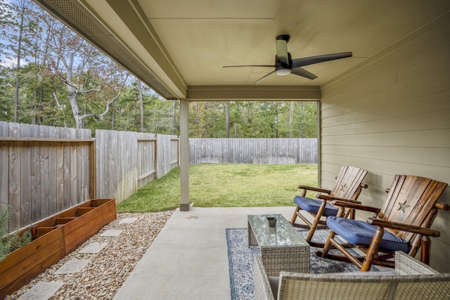 view of patio featuring ceiling fan