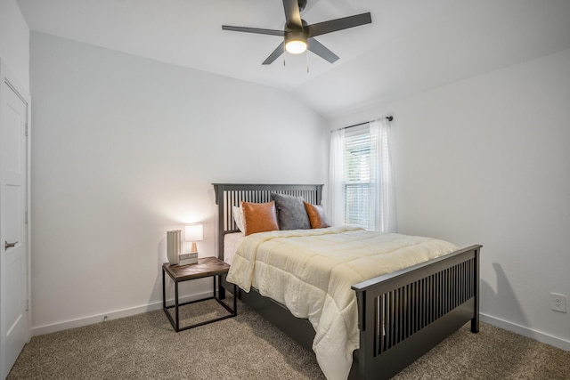 carpeted bedroom featuring vaulted ceiling and ceiling fan