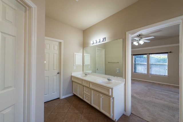 bathroom featuring tile patterned flooring, vanity, and ceiling fan