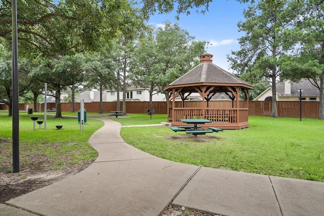 view of property's community featuring a gazebo and a lawn