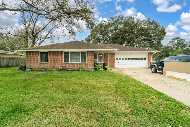 single story home featuring a garage and a front lawn