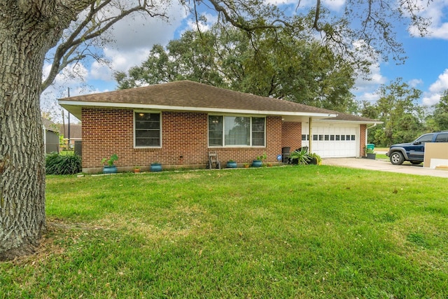 ranch-style home featuring a garage and a front lawn