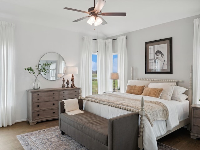 bedroom featuring ceiling fan and hardwood / wood-style flooring