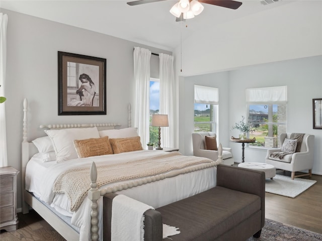 bedroom featuring ceiling fan and dark wood-type flooring