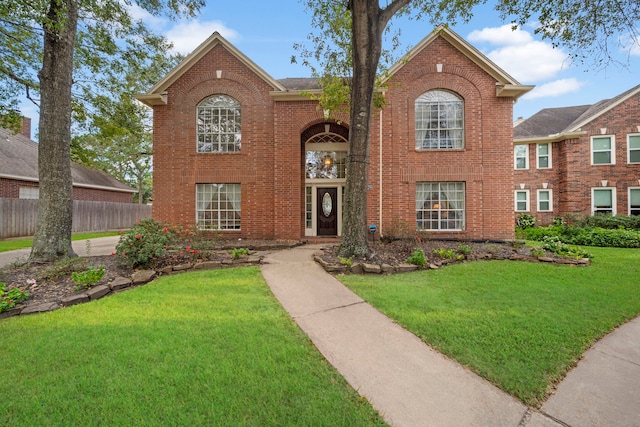 view of property with a front lawn