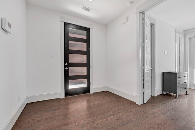 foyer featuring dark hardwood / wood-style floors