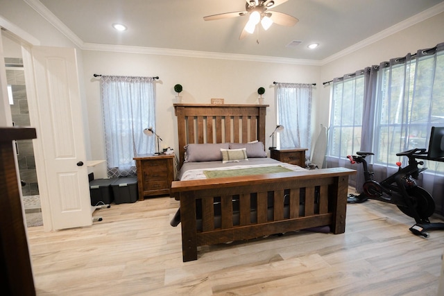 bedroom featuring ceiling fan, light wood-type flooring, and crown molding