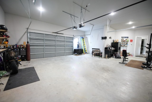 garage featuring a garage door opener